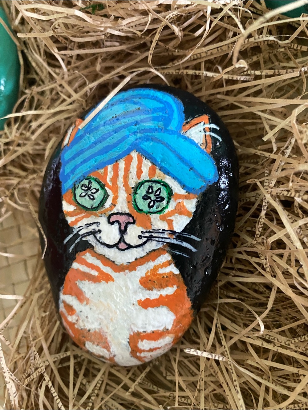 Hand-Painted Orange Tabby Cat Spa day on Natural Rock